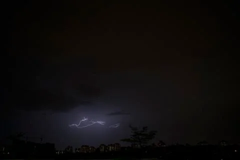 Lightning on a dark sky Stock Photos
