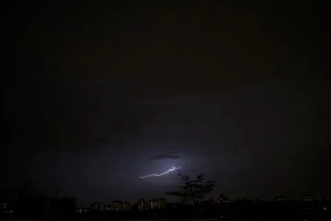 Lightning on a dark sky Stock Photos