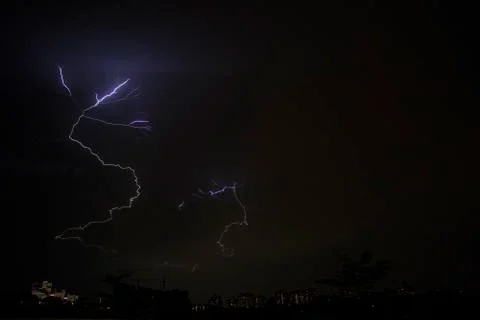 Lightning on a dark sky Stock Photos