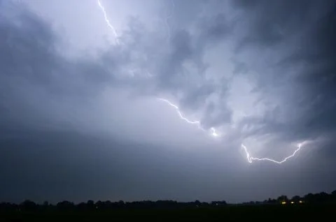 Lightning during thunderstorm Stock Photos