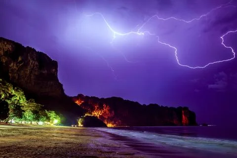 Lightning flashes on beach Stock Photos