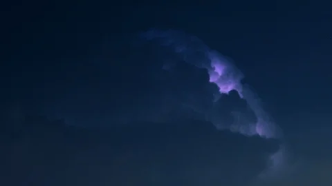 Lightning flashes in billowing night clouds Stock Footage 108487206