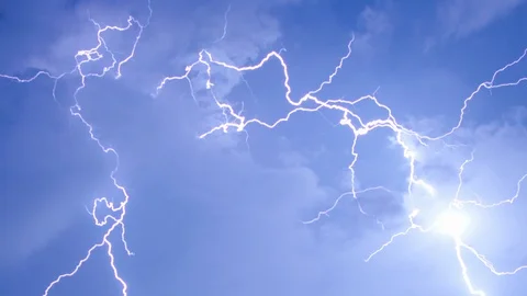 Lightning flashes in billowing night clouds TILT UP Stock Footage 108498069