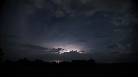 Lightning Flashes in Clouds on the Horizon at Night in Kentucky Video stock 96752579