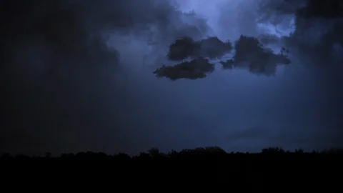 Lightning Flashes Horizon in Storm Clouds - Thunderstorm Stock Footage