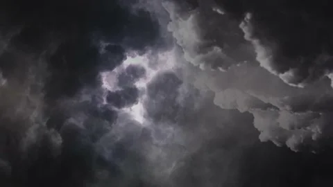 lightning flashes inside dark clouds in ... | Stock Video | Pond5