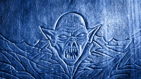 Lightning Flashes Light Up Demon Stone Carving In Rain Stock Footage 282935452
