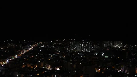 Lightning flashes over city in black sky. Video stock 291010733