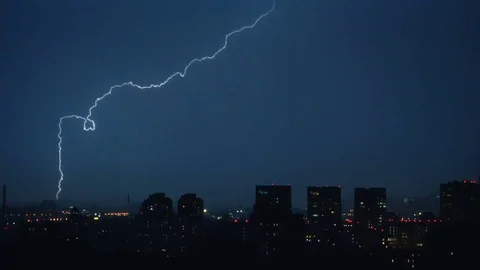 Lightning flashes over the city Stock Footage 79544806