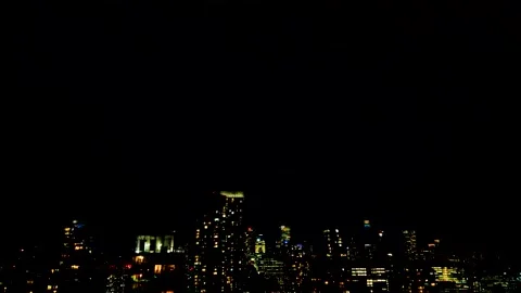 Lightning flashes over Toronto skyline at night.  Stock Footage 347533268