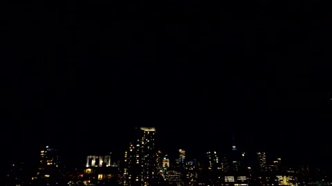 Lightning flashes over the Toronto skyline at night during a severe summer storm Stock Footage 347680004