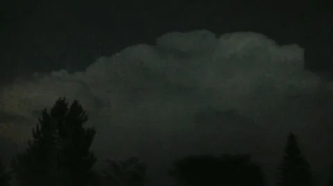 Lightning Flashes in Thunderhead Cloud Stockbeeldmateriaal 12593189