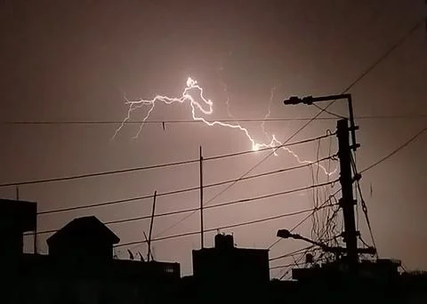 Lightning is flashing in the sky Stock Photos