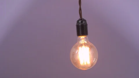 Lightning glass bulb and human hands wiping its surface with accuracy. Stock Footage 129506877