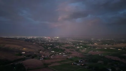 Lightning Illuminates Thunderstorm Over Yakima Valley at Night Stock Footage 345888019