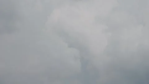 Lightning lights up dark storm clouds during intense rainfall Stock Footage 318821123