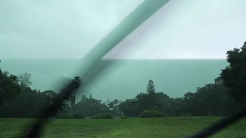 Lightning Over Community Through Windshield Wipers Stock Footage 318315139