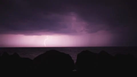 Lightning over sea 1 Stock Footage 130880936