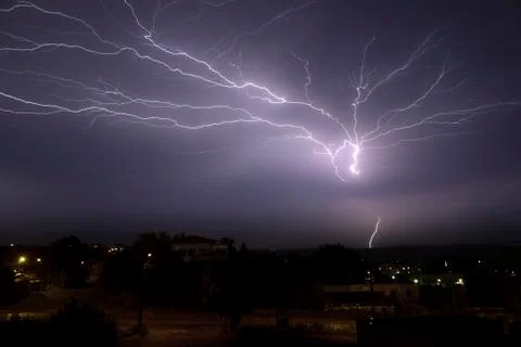 Lightning over small town Stock Photos