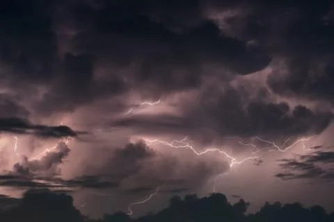 Lightning in the rainstorm at night Stock Photos