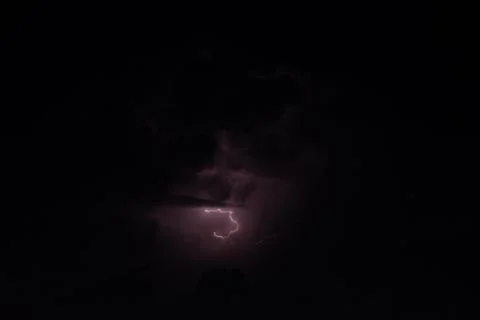 Lightning in the rainstorm at night Stock Photos