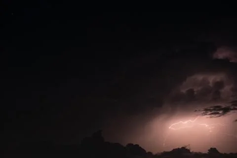 Lightning in the rainstorm at night Stock Photos