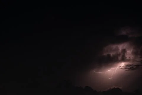 Lightning in the rainstorm at night Stock Photos