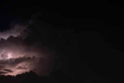 Lightning in the rainstorm at night Stock Photos