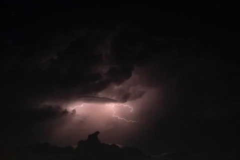 Lightning in the rainstorm at night Stock Photos