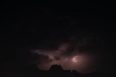 Lightning in the rainstorm at night Stock Photos