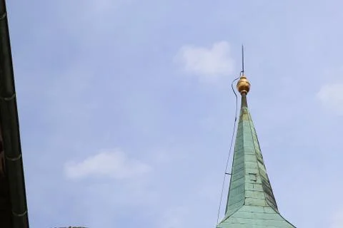 Lightning rod with copper globe on an old building Stock Photos