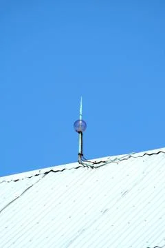 Lightning rod on top of a barn Stock Photos