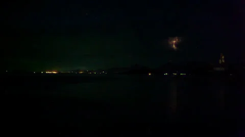 Lightning in the sea during the night time. Flies Ufo. Time lapse video speed up Видео 39578399