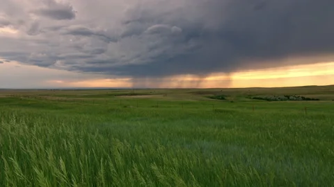 Lightning shooting through the sky as dramatic storm moves over the plains Stock Footage 155600829