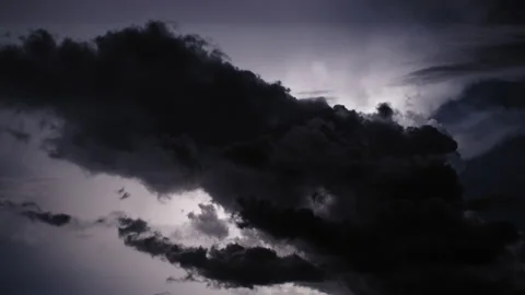 Lightning in the sky in the clouds during a night storm Stock Footage 205506573