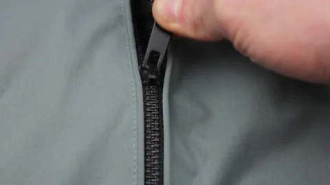 The Lightning snake close-up. ZIP up. Jacket fastening. Stock Footage 171927170