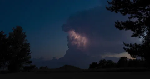 Lightning storm clouds timelapse at summer night sky Stock Footage