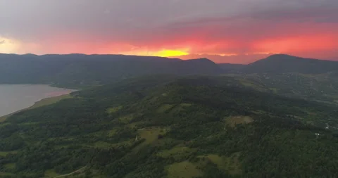 Lightning storm in evening over mountains Stock Footage 135391624