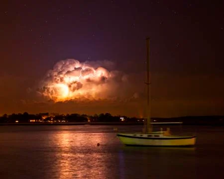 Lightning storm at night Stock Photos