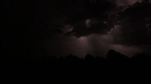 Lightning Storm Over Dark Landscape at Night Stock Footage 337655721