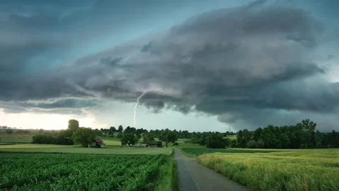 Lightning storm over farm land in Spring  Loopable Stock Footage 162482078