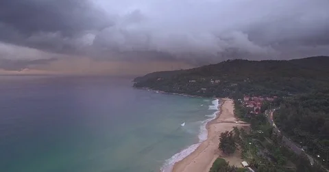 Lightning From A Storm Over Karon Beach In Phuket, Thailand, Aerial Pullback Video stock 80187105