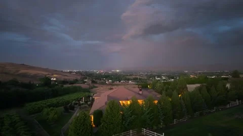 Lightning Storm Over Yakima Orchard at Dusk Stock Footage 345887987