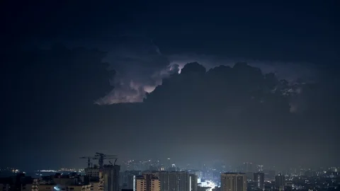 Lightning storm as stars fall over city skyline night Singapore 8K Stock Footage 108539706