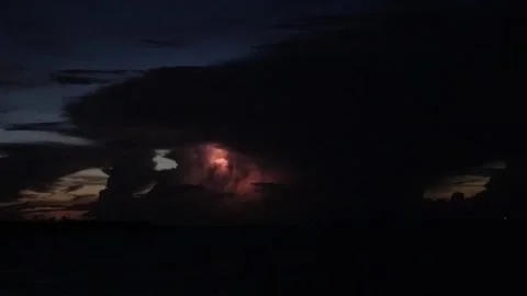 Lightning storm as viewed from a sailboat, Cayo Costa Florida Stock Footage 160380488