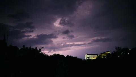 Lightning storms in the sky late at night Stock Footage 314635391