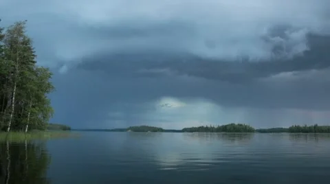 Lightning strike behind a calm lake Stock-Footage 54508133