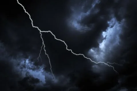 Lightning strike on the dark sky. Stock Photos