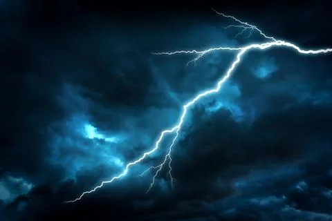 Lightning strike on a dark sky. Stock Photos