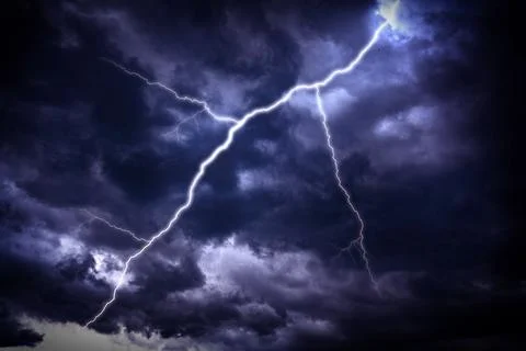 Lightning strike on a dark sky. Stock Photos